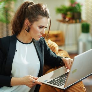 Woman worried about her small business being attacked by phishing online